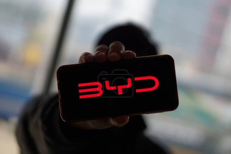 Photo for Dhaka,Bangladesh 06 April 2024:BYD Co. Ltd. "Build Your Dreams" logo on smartphone  . Is Chinese conglomerate manufacturing company. BYD is major competitor of Tesla in China - Royalty Free Image