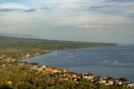 Coastline of Bali in Karangasem district, touristict fishing villlage Amed during early morning sunlight