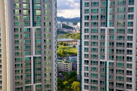 Photo for Ulsan's cityscape bathed in daylight, highlighting architectural details and the vibrant life of the urban expanse. - Royalty Free Image
