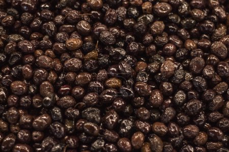 Photo for Dried olives on the counter of the supermarket. Healthy food. - Royalty Free Image