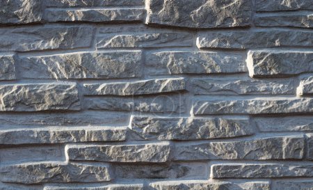Texture of decorative white slate stone wall surface