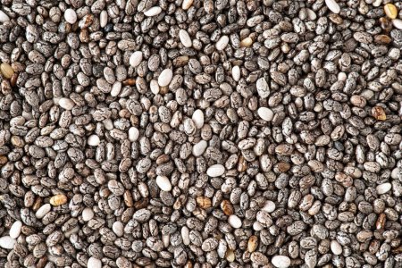 Texture of grey chia seeds seen from the side