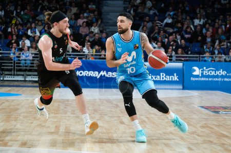 Photo for Player of Movistar Estudiantes seen in action during the LEB Oro Match between Movistar Estudiantes and Cantabria at WiZink Center. December 3 - Royalty Free Image