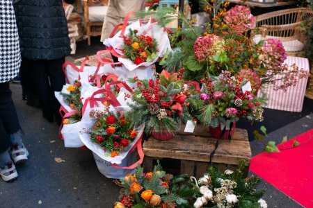 Photo for View of the Madrid Christmas Flower Market on Jorge Juan Street, December 16, 2023, Spain - Royalty Free Image