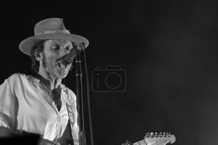 Photo for The singer Leiva performs during a concert at the WiZink Center, on 19 December, 2023 in Madrid, Spain. - Royalty Free Image