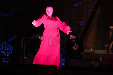 Photo for Flamenco dancer Carmen Talegona performs during Sandra Carrasco's concert at the Church of Our Lady of Guadalupe in Madrid, December 29, 2023, Spain - Royalty Free Image
