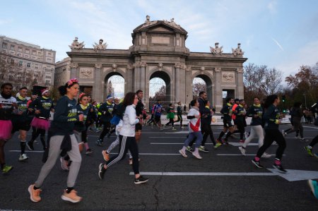 Photo for A runner  during the San Silvestre Vallecana 2023 Popular Race, on 31 December, 2023 in Madrid, Spain. - Royalty Free Image