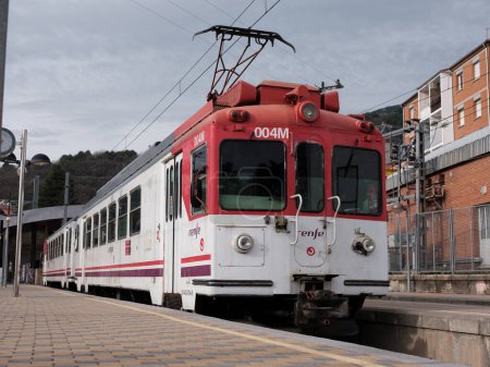 Photo for Renfe series 442 narrow gauge train, parked at the Cercedilla train station, line C-9, to Navacerrada and Cercedilla. Madrid, January 2, 2024 Spain - Royalty Free Image
