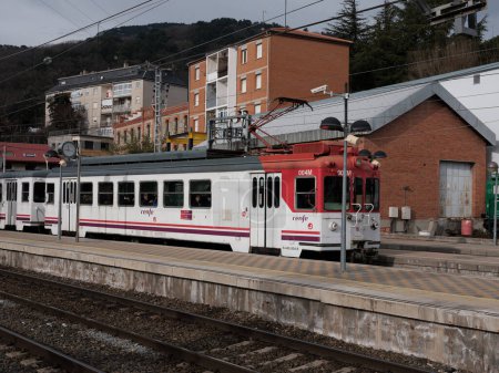 Photo for Renfe series 442 narrow gauge train, parked at the Cercedilla train station, line C-9, to Navacerrada and Cercedilla. Madrid, January 2, 2024 Spain - Royalty Free Image