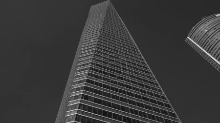 Photo for View of the Crystal Tower on Paseo de la Castellana in Madrid, in the financial complex of the 4 towers. in Spain - Royalty Free Image