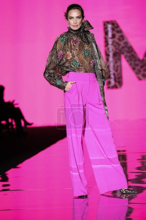 Photo for A model parades with LOLA CASADEMUNT BY MAITE design during Mercedes Benz Fashion Week Madrid in Madrid IFEMA, 15 of February of 2023 Spain - Royalty Free Image