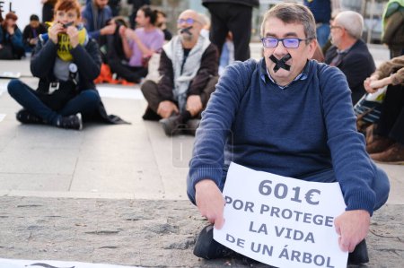Photo for Protesters during a demonstration against the gag law and police repression in Spain in the Plaza de Colon in Madrid, on February 20, 2024. Spain - Royalty Free Image