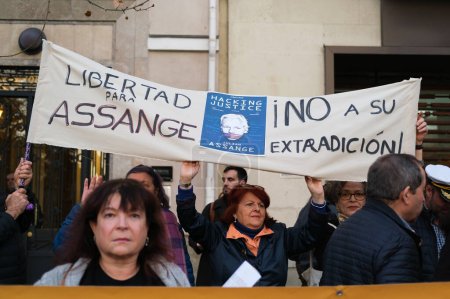 Photo for Protesters during a demonstration in support of Wikileaks founder Julian Assange in front of the US embassy in Madrid, on February 20, 2024. Spain - Royalty Free Image