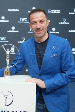 Photo for Laureus Academy Member Alessandro del Piero poses with The Laureus World Sports Award trophy during the Laureus World Sports Awards 2024 nominations announcement at Real Casa de Correos on February 26, 2024 in Madrid, Spain - Royalty Free Image