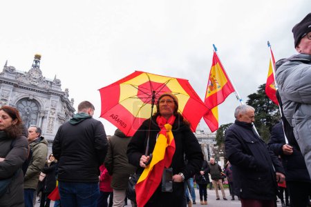 Photo for Several people during a rally calling for the contra la amnista resignation of Pedro Sanchez, at Plaza de Cibeles, on March 9, 2024, in Madrid  Spain - Royalty Free Image