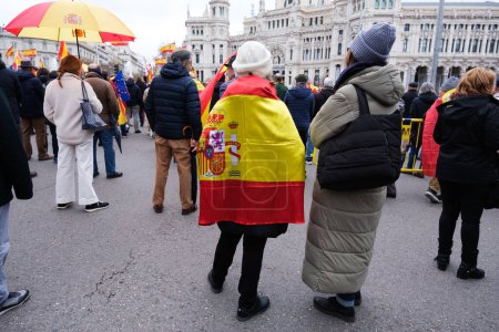 Photo for Several people during a rally calling for the contra la amnista resignation of Pedro Sanchez, at Plaza de Cibeles, on March 9, 2024, in Madrid  Spain - Royalty Free Image