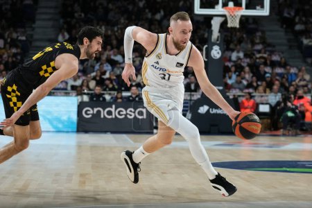 Photo for Dzanan Musa  of Real Madrid  in action during Liga ACB match between Real Madrid and Lenovo Tenerife at WiZink Center on March 10, 2024 in Madrid, Spain. - Royalty Free Image