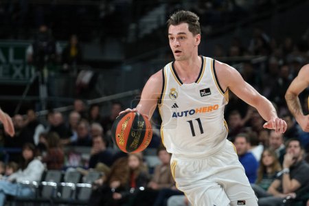 Photo for Mario Hezonja  of Real Madrid  in action during Liga ACB match between Real Madrid and Lenovo Tenerife at WiZink Center on March 10, 2024 in Madrid, Spain. - Royalty Free Image