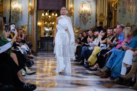 Photo for Model showcases creations by DE LA CIERVA y NICOLS during the Atelier Couture bridal catwalk within Madrid Fashion Week, at Santa Isabel Palace in Madrid. 13 marzo 2024 Spain - Royalty Free Image