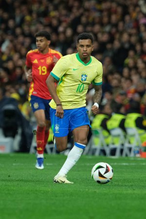 Photo for Raphinha  of Brazil during the friendly match between Spain and Brazil at Santiago Bernabeu Stadium in Madrid on March 26  Spain - Royalty Free Image
