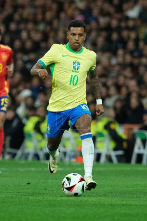 Photo for Raphinha  of Brazil during the friendly match between Spain and Brazil at Santiago Bernabeu Stadium in Madrid on March 26  Spain - Royalty Free Image