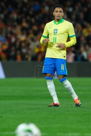 Photo for Richarlison   of Brazil during the friendly match between Spain and Brazil at Santiago Bernabeu Stadium in Madrid on March 26  Spain - Royalty Free Image