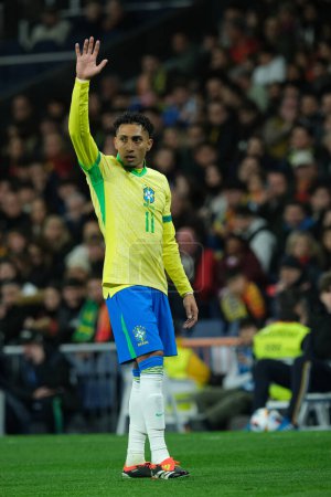 Photo for Richarlison   of Brazil during the friendly match between Spain and Brazil at Santiago Bernabeu Stadium in Madrid on March 26  Spain - Royalty Free Image