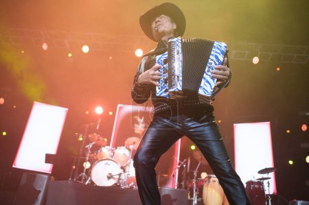 Photo for Musical group Los Tigres Del Norte perform during concert at the WizCenter in Madrid, April 4, 2024, Spain - Royalty Free Image