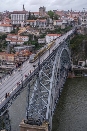 Photo for View of the Luis I Bridge, a double-deck metal arch bridge that spans the Douro River between the cities of Porto and Vila Nova de Gaia, April 15, 2024 in Portugal. - Royalty Free Image