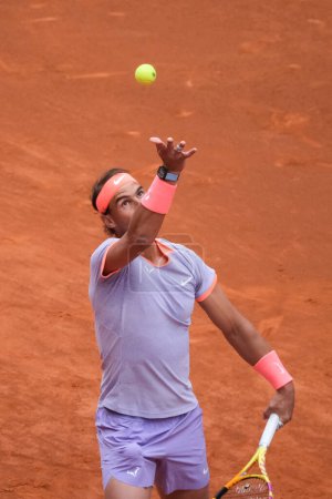 Photo for Rafael Nadal of Spain in action against Darwin Blanch on Day Three during their second round match of the Mutua Madrid Open at La Caja Magica on April 25, 2024 in Madrid, Spain - Royalty Free Image