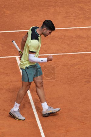 Photo for Carlos Alcaraz of Spain  against Alexander Shevchenko  during their second round match on day four of the Mutua Madrid Open at La Caja Magica on April 26, 2024 in Madrid, Spain. - Royalty Free Image