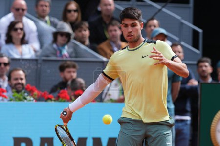 Photo for Carlos Alcaraz of Spain  against Alexander Shevchenko  during their second round match on day four of the Mutua Madrid Open at La Caja Magica on April 26, 2024 in Madrid, Spain. - Royalty Free Image