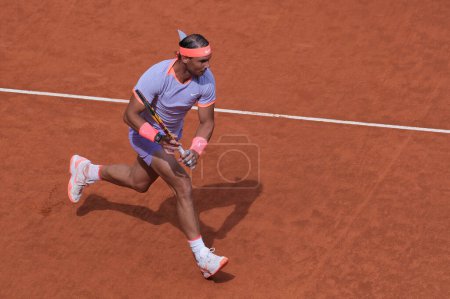 Photo for Rafael Nadal of Spain against Cachin a in their round of 32 match during Day Seven of the Mutua Madrid Open at La Caja Magica on April 29, 2024 in Madrid, Spain - Royalty Free Image