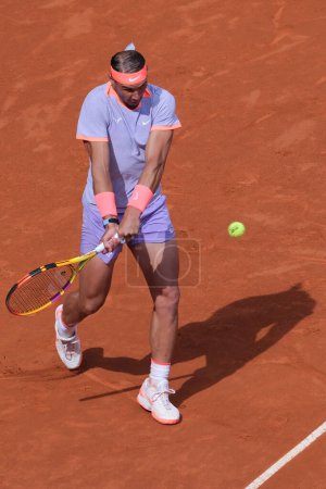 Photo for Rafael Nadal of Spain against Cachin a in their round of 32 match during Day Seven of the Mutua Madrid Open at La Caja Magica on April 29, 2024 in Madrid, Spain - Royalty Free Image