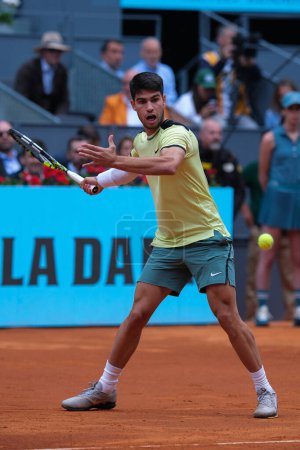 Photo for Carlos Alcaraz of Spain against  Struff  during their Men's Round of 16 match on day eight of the Mutua Madrid Open at La Caja Magica on April 30, 2024 in Madrid, Spain. - Royalty Free Image