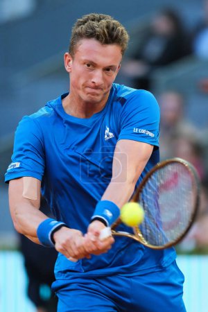 Photo for Jiri Lehecka of Czechia against Daniil Medvedev during the Men's Singles quarter-final match on Day Ten of Mutua Madrid Open at La Caja Magica on May 02, 2024 in Madrid, Spain. - Royalty Free Image