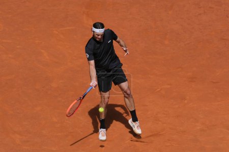 Photo for Taylor Fritz of USA against Andrey Rublev during the Men's Singles semi-final match on Day Eleven of Mutua Madrid Open at La Caja Magica on May 03, 2024 in Madrid, Spain. - Royalty Free Image