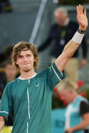 Photo for Andrey Rublev poses with the Mutua Madrid Open trophy following victory in the Men's Singles Final match against Felix Auger  of Mutua Madrid Open at La Caja Magica on May 05, 2024 in Madrid, Spain. - Royalty Free Image