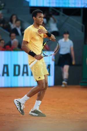 Photo for Felix Auger Aliassime of Canada  during the Men's Singles Final match against Andrey Rublev on Day Thirteen of Mutua Madrid Open at La Caja Magica on May 05, 2024 in Madrid, Spain. - Royalty Free Image
