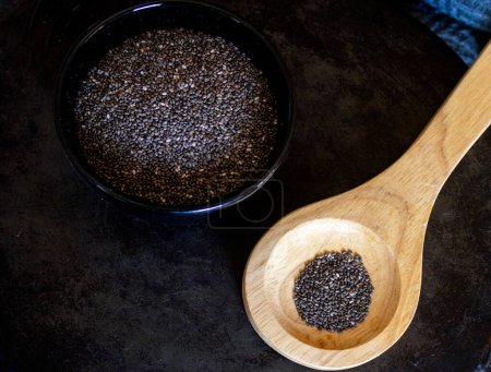 Chia grains, source of vitamins and omega-3. .Healthy grains.Close-up photo.with dark background