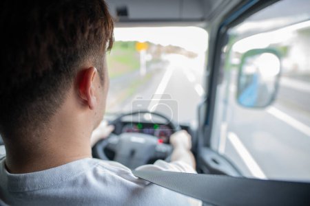 Photo for Man driving a big truck - Royalty Free Image