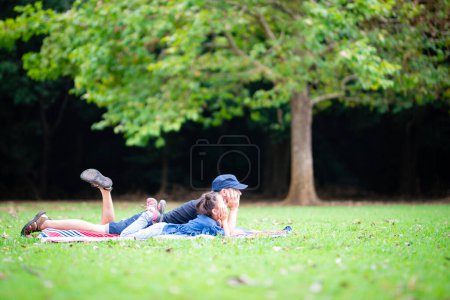 Photo for Father and daughter having a picnic - Royalty Free Image