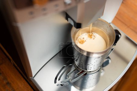 Photo for Coffee poured into a cup - Royalty Free Image