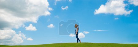 Photo for Woman relaxing in a meadow - Royalty Free Image