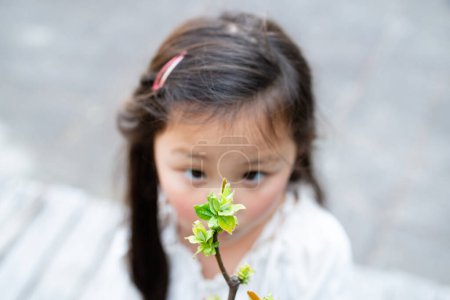 Photo for Girl who found a new sprout - Royalty Free Image