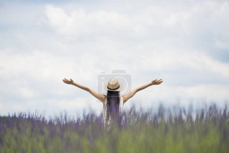 Photo for Beautiful Japanese woman to see the lavender field - Royalty Free Image