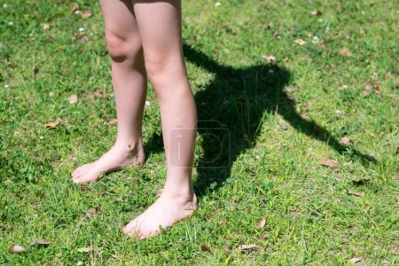 Photo for The feet of a child playing barefoot - Royalty Free Image