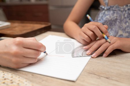 Photo for Hands of a child who is taught to study - Royalty Free Image