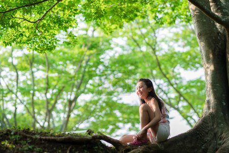 Photo for Girl relaxing in the shade - Royalty Free Image