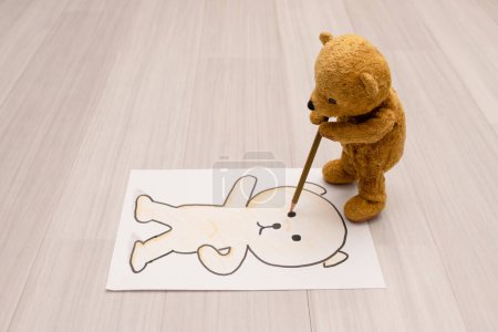 Photo for Teddy bear drawing self portrait - Royalty Free Image